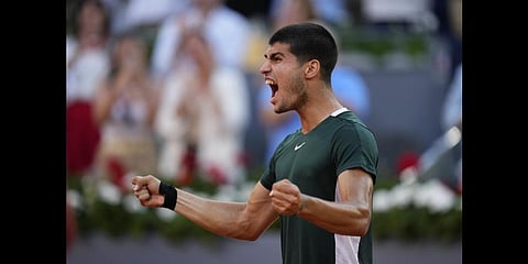 Carlos Alcaraz celebrates after defeating Novak Djokovic during a men's semifinal at the Mutua Madrid Open tennis tournament in Madrid, Spain, Saturday, May 7, 2022. (Photo | AP)