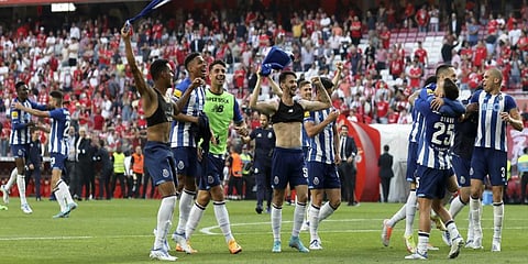 FC Porto players celebrate winning the Portuguese league after defeating Benfica 1-0.(Photo | AP)