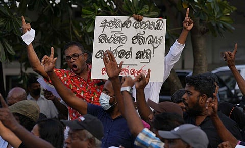 National People's Power supporters shout slogans during a protest in Colombo, Sri Lanka, Saturday, May 7, 2022. (Photo | AP)