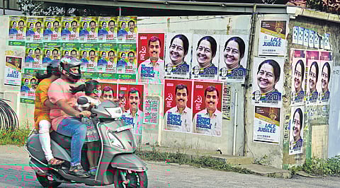 With major political fronts announcing their candidates for the bypoll, walls in Thrikkakara assembly constituency sport a colourful look as posters cover every inch of space | A Sane sh