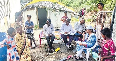 The HRF and RSV team interacts with family members of a farmer who committed suicide, in Uyyalawada mandal of Nandyal district. (Photo| EPS)