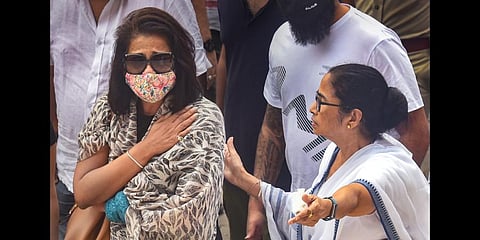West Bengal Chief Minister Mamata Banerjee consoles Jyothy Krishna, wife of Bollywood playback singer Krishnakumar Kunnath .(Photo | PTI)