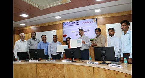 AstraZeneca and SASTRA signing an MoU the Thanjavur on Tuesday | Express