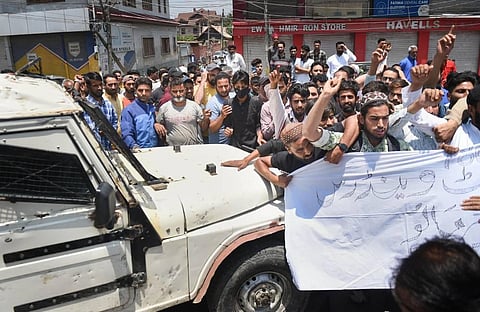 Kashmiri Muslims shout slogans during their protest march against controversial remarks by two now-suspended BJP leaders about Prophet Mohammad, in Srinagar. (Photo | PTI)
