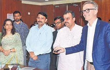 Minister V Sunil Kumar and Bristish High Commissioner Alex Ellis launched the EV portal on Thursday | Vinod Kumar T