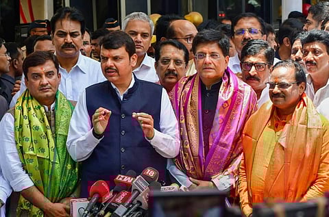 Devendra Fadnavis speaks to media as BJP Rajya Sabha candidates Dhananjay Mahadik, Piyush Goyal and Anil Bonde look on after filing nomination for Rajya Sabha membership. (Photo | PTI)