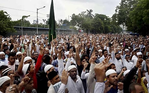 People belonging to Muslim community stage a protest over the controversial remarks by two now-suspended BJP leaders against Prophet Mohammad, near Park Circus in Kolkata. (Photo | PTI)