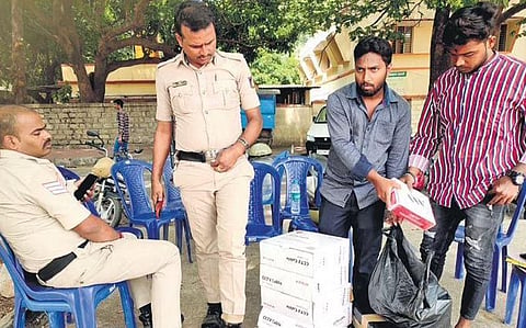 City police personnel fix CCTV cameras at the Idgah Maidan at Chamarajpet in Bengaluru on Friday | Yacoob Mohammed