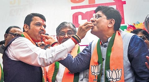 Former Maharashtra CM Devendra Fadnavis with Union Minister and winning BJP candidate Piyush Goyal in Mumbai on Saturday (Photo | PTI)