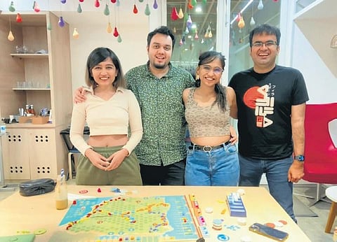 Nikhil Khanna (rightmost) with members of the community playing ‘Iberian Gauge’