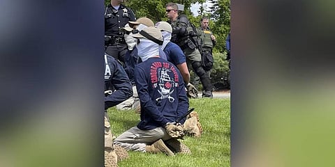 Authorities arrest members of the white supremacist group Patriot Front near an Idaho pride event on Saturday, June 11, 2022. (Photo | AP)