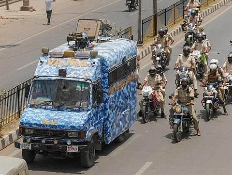 Security personnel conduct a flag march to maintain law and order following clashes during protest against remarks on Prophet Muhammad, in Ranchi. (Photo | PTI)