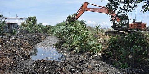 Desilting works of stormwater drains is carried in Coimbatore. (Photo| EPS)