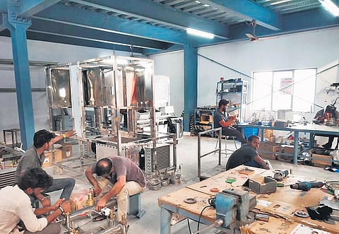 Labourers engaged in manufacturing works at the Green Industrial Park in Dandumalkapur of Yadadri Bhuvanagiri district
