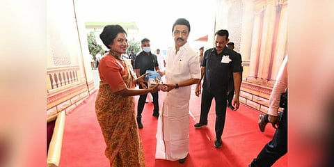 Pudukkottai  District Collector Kavitha Ramu gifts CM Stalin a copy of Nivedita Louis’ 'Ariyappadatha Christhavam'.
