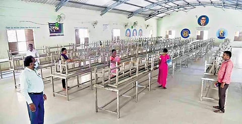 Sanitation staff clean the dining hall of the Telangana Minority Welfare Residential School at Ibrahimpatnam in Rangareddy district on Sunday ahead of the school reopening | Vinay Madapu