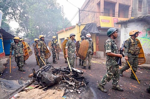 Security personnel deployed after violence during protest over controversial remarks made by two now-suspended BJP leaders about Prophet Mohammad, in Howrah. (Photo | PTI)