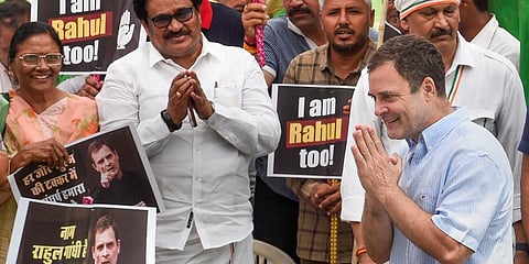 Congress leader Rahul Gandhi meets party workers at the AICC headquarters before leaving for the Enforcement Directorate (ED) office to appear in the National Herald case. (Photo|PTI)