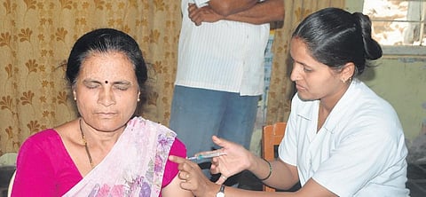 Representational image of a woman receiving the Covid vaccine. (Photo | Express)