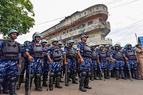 Rapid Action Force (RAF) personnel prepare for the maintenance of law and order in the clash-hit Atala area, a day before Muslims' Friday prayers. (Photo | PTI)