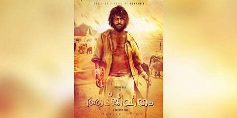 A poster of the movie 'Aadujeevitham'