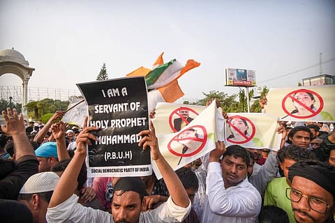 Members of Social Democratic Party of India (SDPI) stage a protest over the controversial remarks by two now-suspended BJP leaders against Prophet Mohammad. (Photo | PTI)