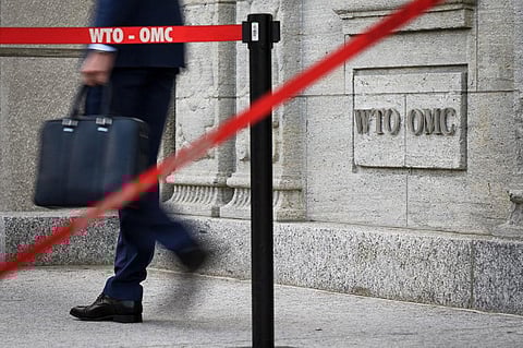 A delegate leaves a World Trade Organisation in Geneva.(File | AFP)