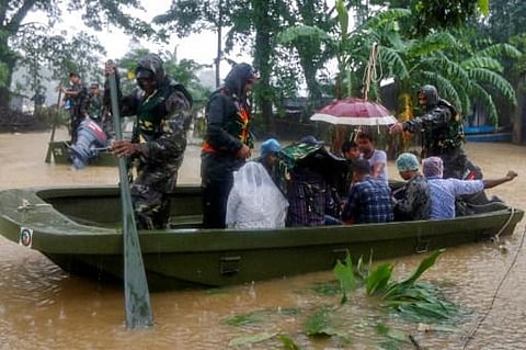 Relentless downpours have inundated the country,  troops have been deployed to evacuate households. (Photo | AFP)