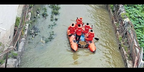 Fire and Emergency Service and NDRF personnel launch a joint search operation for 28-year-old Mithun (right), who was washed away at KR Puram in Bengaluru on Friday night | Express
