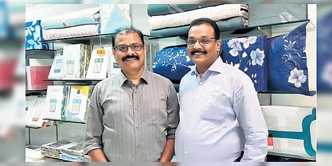 Stephen Antony Kallarackal (right) with former India international U Sharaf Ali