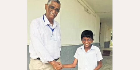 K S Rajan, the seniormost old boy of Sainik School Kazhakootam, with the juniormost cadet, Akshay S Dilshah, at the 53rd OBA reunion on Saturday