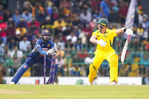 Sri Lanka's Niroshan Dickwella breaks the wicket to dismiss Australia's Marnus Labuschagne during the third ODI cricket match between Australia and Sri Lanka in Colombo, June 19, 2022. (Phone | AP)