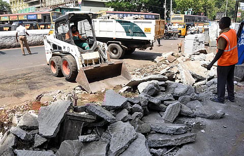 Chennai Corporation officials clearing the NSC Bose Road on Friday, after the encroachments were removed. (Photo| R Satish Babu, EPS)
