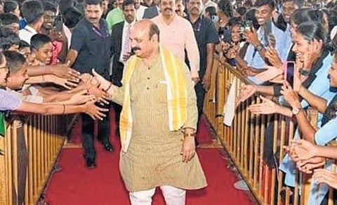 Chief Minister Basavaraj Bommai interacts with students during a programme in Moodbidri near Mangaluru on Wednesday | EXPRESS