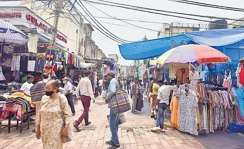 Overhead wires are commonplace in key markets of Delhi.