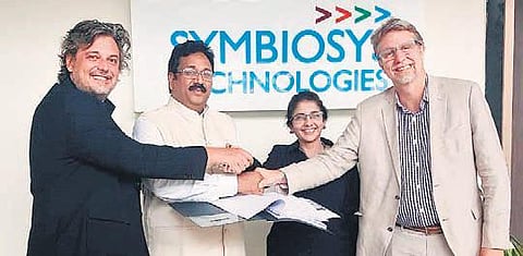 Symbiosis Technologies CEO O Naresh Kumar exchange agreement documents with representatives of US and Brazil companies | express