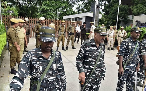 Security personnel keep vigil outside a hotel where dissident MLAs of Maharastra are staying, in Guwahati. (Photo | PTI)