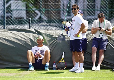 Rafael Nadal, left, sits during a practice session ahead of the Wimbledon Tennis Championships in London, Tuesday June 21, 2022. (Photo | AP)