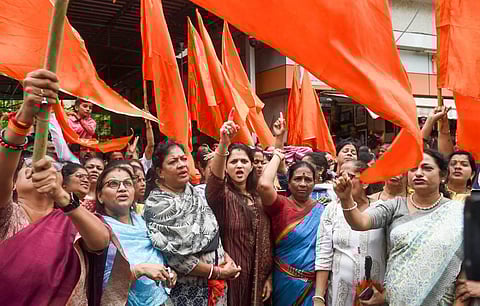 Shiv Sena supporters shouts slogan in support of Chief Minister of Maharashtra Uddhav Thackeray, outside Shiv Sena Bhavan, Shivaji Park in Mumbai. (Photo | PTI)
