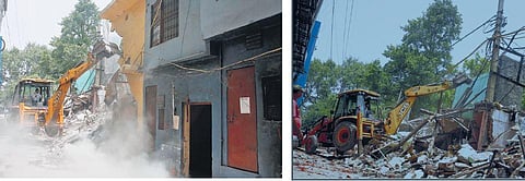 Demolition drive in process on Wednesday behind the Bahadur Shah Zafar Marg; As many as 50 were razed down, leaving some residents homeless and in despair. (Photo | Shekar Yadav, EPS)