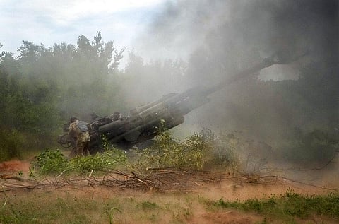 Ukrainian soldiers fire at Russian positions from a U.S.-supplied M777 howitzer in Ukraine's eastern Donetsk region Saturday, June 18, 2022.(Photo | AP)