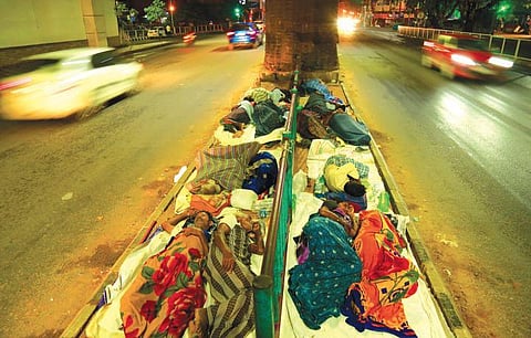 By midnight, some stretches under the Metro are packed with homeless people, including daily wagers and beggars