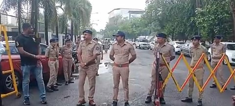 Policemen guarding Surat's Le Meridien hotel where dissident Sena leader Eknath Shinde was camping along with other MLAs.