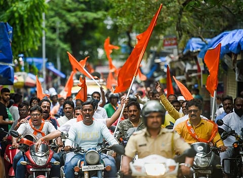 Shiv Sena supporters shout slogans during a bike rally in support of Chief Minister of Maharashtra Uddhav Thackeray, outside Shiv Sena Bhavan. (Photo | PTI)