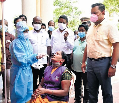 Health Minister Ma Subramanian inspects testing at an apartment in Navalur, Chennai | Express