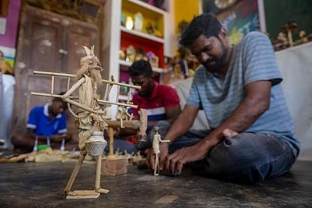 Craft teacher Umapathy with his students at Government High School, Seliamedu in Puduchery. (Photo | Debadatta Mallick, EPS)