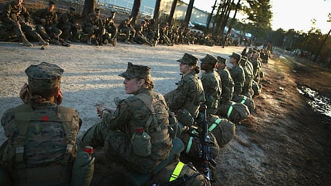 Male and female marines are seen at a military base in North Carolina in February 2013. (File Photo | AFP)