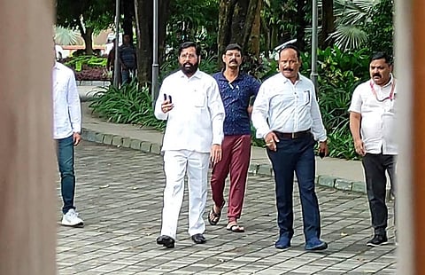 Rebel Shiv Sena leader Eknath Shinde arrives to address media at a hotel where he is staying with other supporting MLAs, in Guwahati. (Photo | PTI)