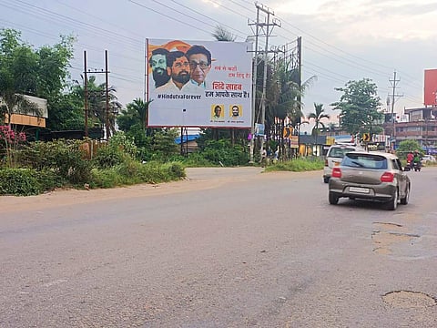 The hoardings put up in Guwahati have pictures of Eknath Shinde, Bal Thackeray and Anand Dighe. (Photo | EPS)