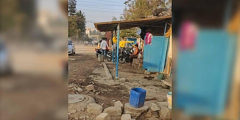 Family encroaches centre of Indira Canteen Road in Yesvantpur Industrial Area for nearly four years.  (Photo | Special Arrangement)